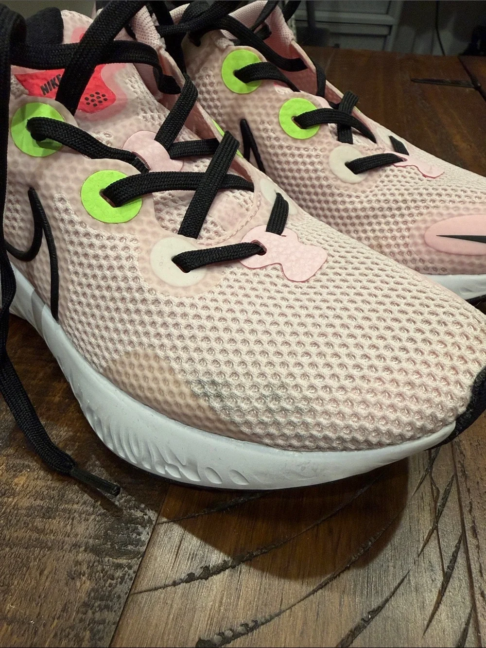 Nike Pink Mesh Running Sneakers with Black Swoosh and Neon Accents